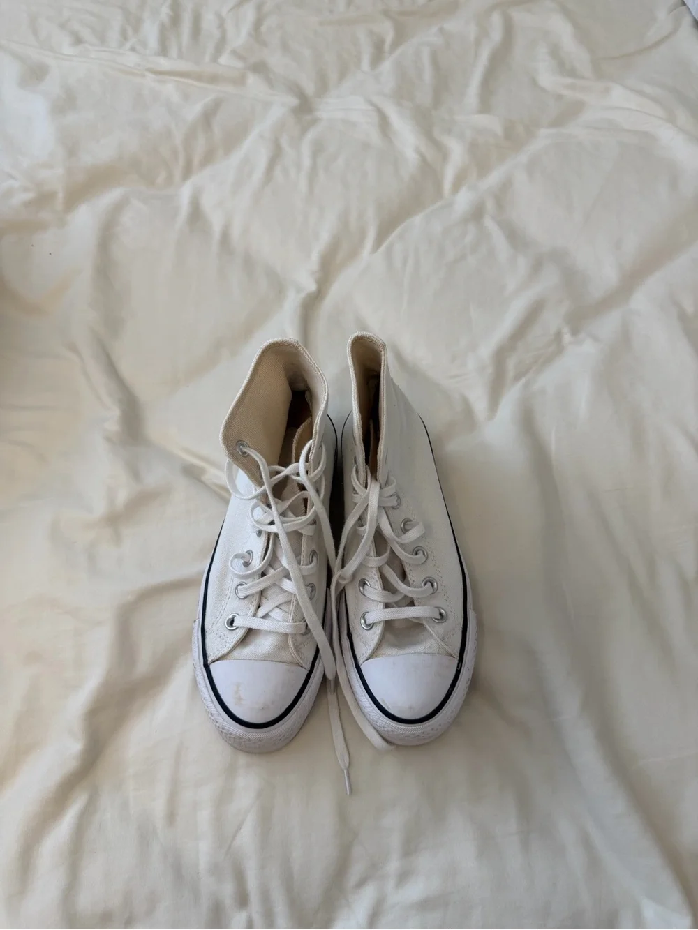 Converse White High-Top Platform Sneakers with Black Trim